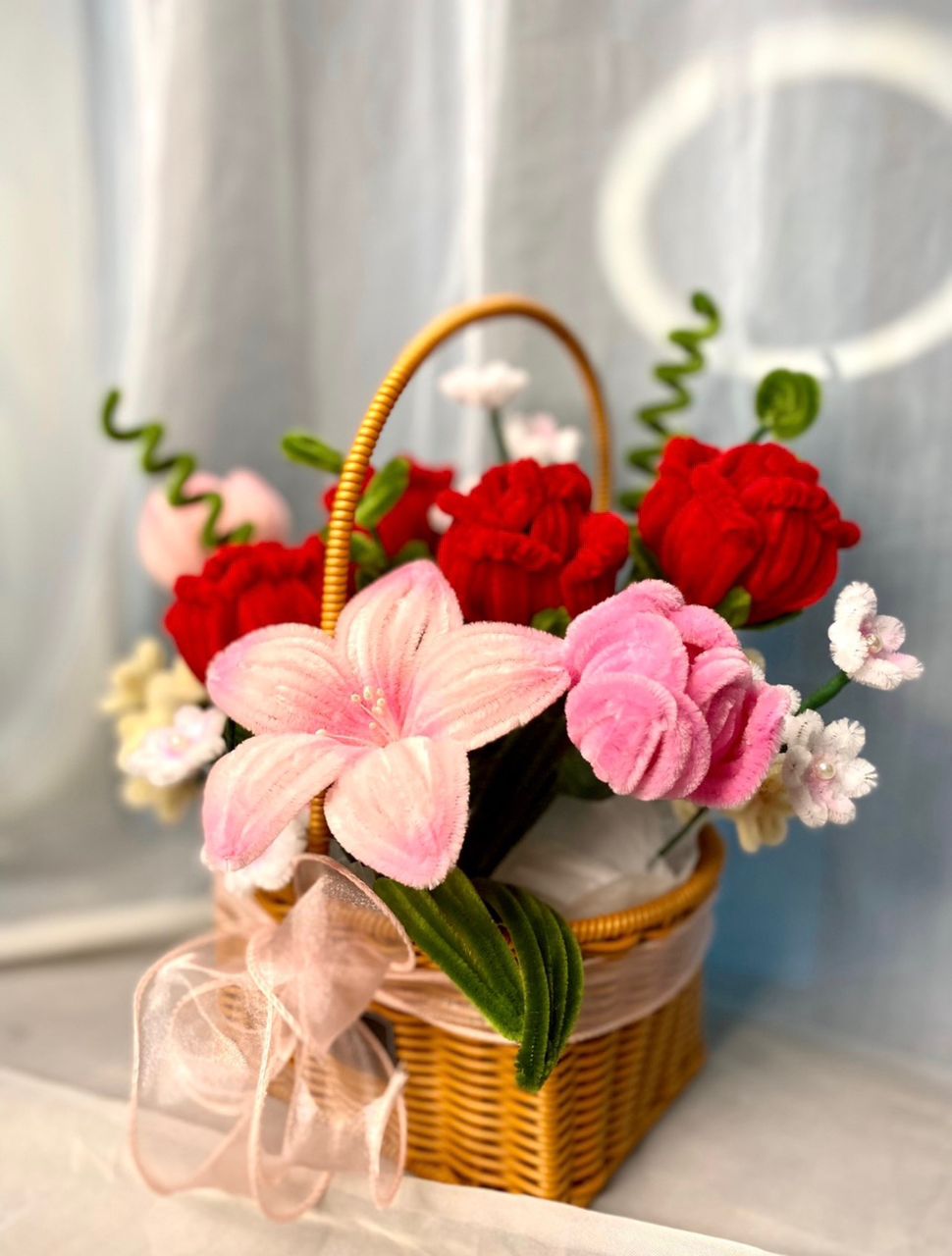 Handcrafted basket with fuzzy-wire flowers