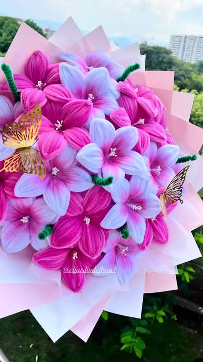 Pink and blue handcrafted fuzzy-wire flowers